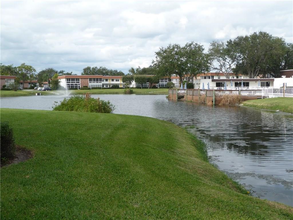 1225 Northwest 21st Street, Unit 912 Stuart, FL 34994 - Photo 32 of 34 Common Area Lake View