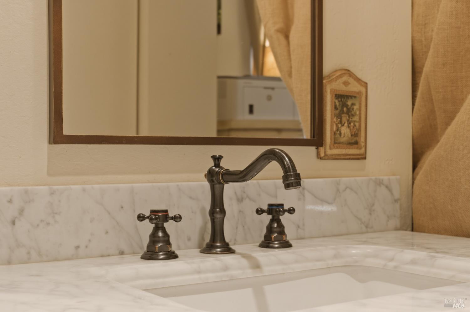 151 High Street Calistoga, CA 94515 - Photo 27 of 52 a bathroom with a granite countertop sink and a mirror