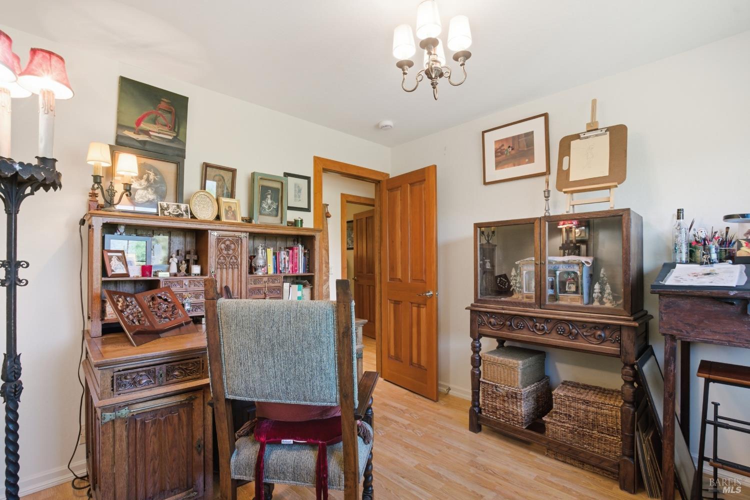 151 High Street Calistoga, CA 94515 - Photo 28 of 52 a living room with fireplace furniture and a window