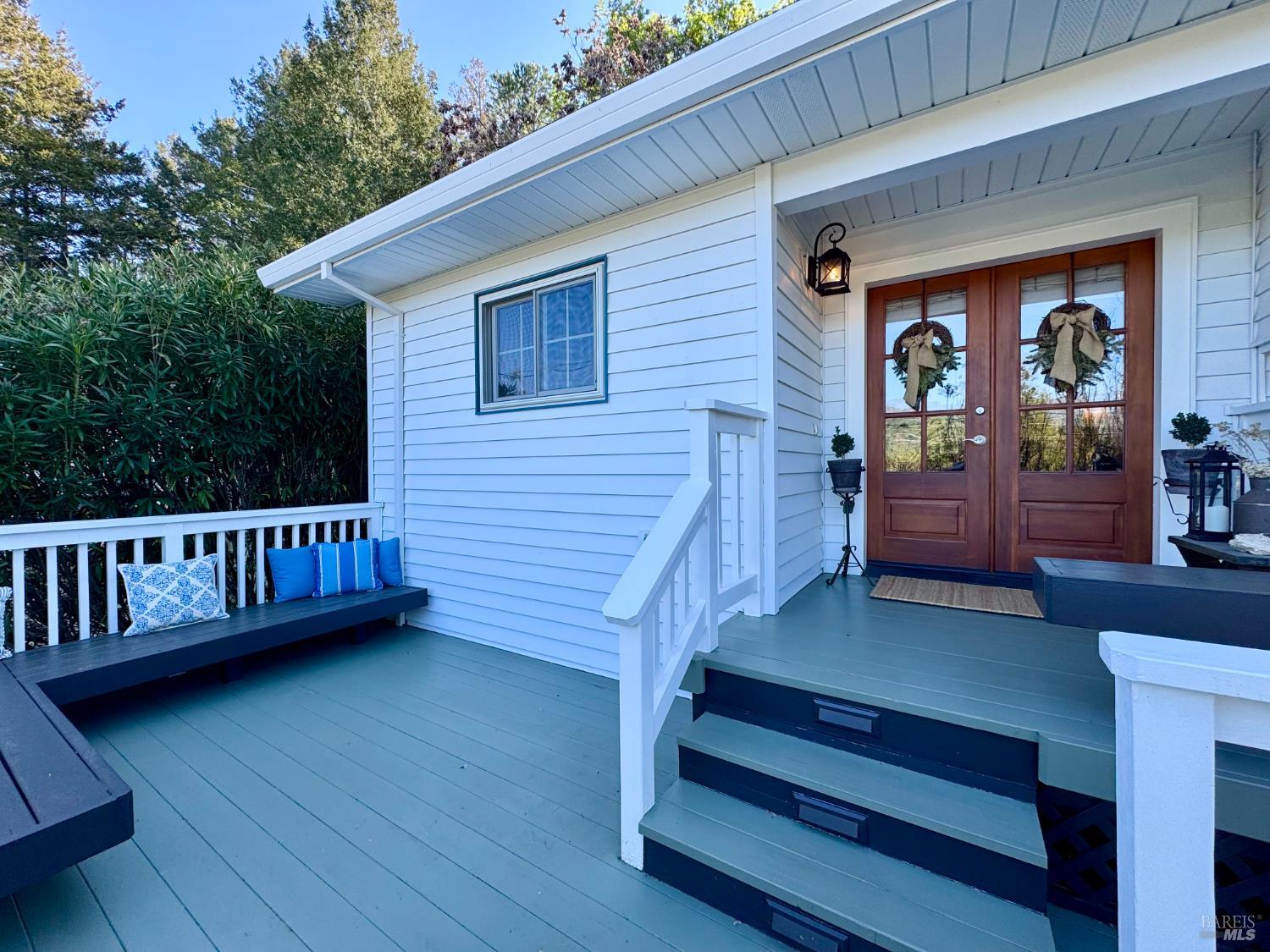 151 High Street Calistoga, CA 94515 - Photo 3 of 52 a view of a deck with two couches and a wooden floor