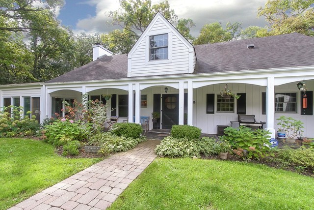 591 Plum Tree Road Barrington Hills, IL 60010 - Photo 2 of 30 front view of a house with a yard