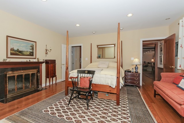 591 Plum Tree Road Barrington Hills, IL 60010 - Photo 14 of 30 a living room with furniture and a fireplace