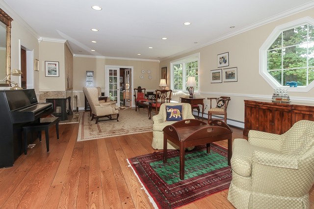 591 Plum Tree Road Barrington Hills, IL 60010 - Photo 5 of 30 a living room with furniture and wooden floor
