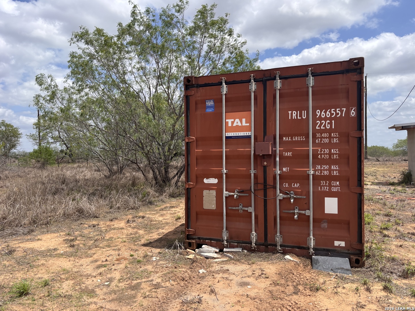 0 County Road 239 Concepcion, TX 78349 - Photo 12 of 38 a view of a house with a door and wooden fence