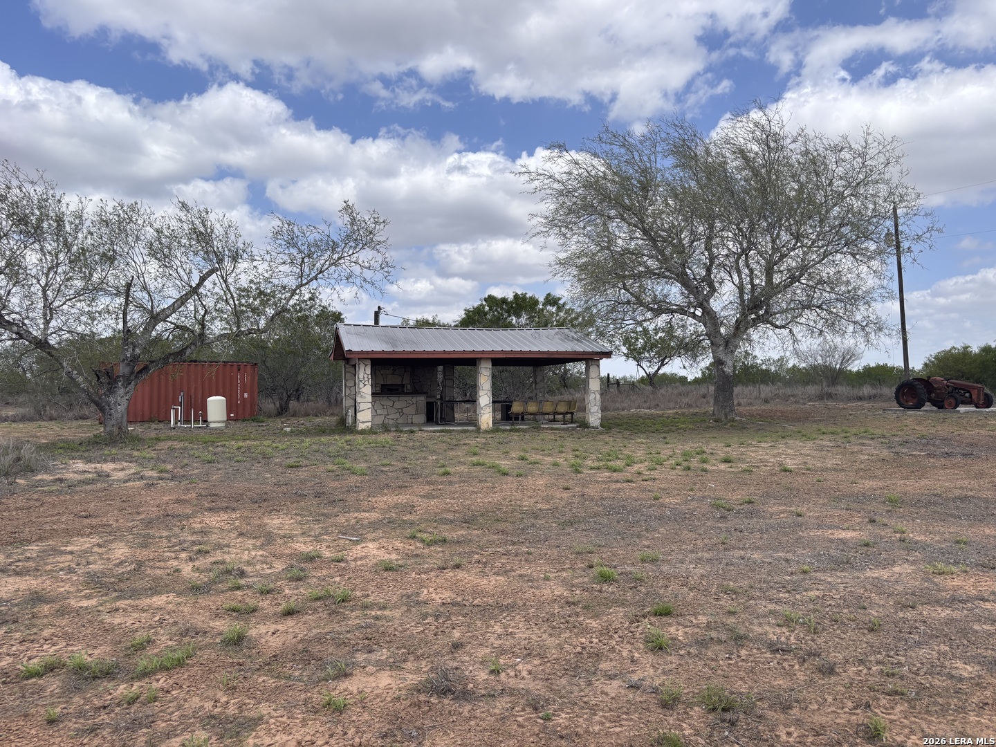 0 County Road 239 Concepcion, TX 78349 - Photo 27 of 38 a front view of a house with a yard and trees