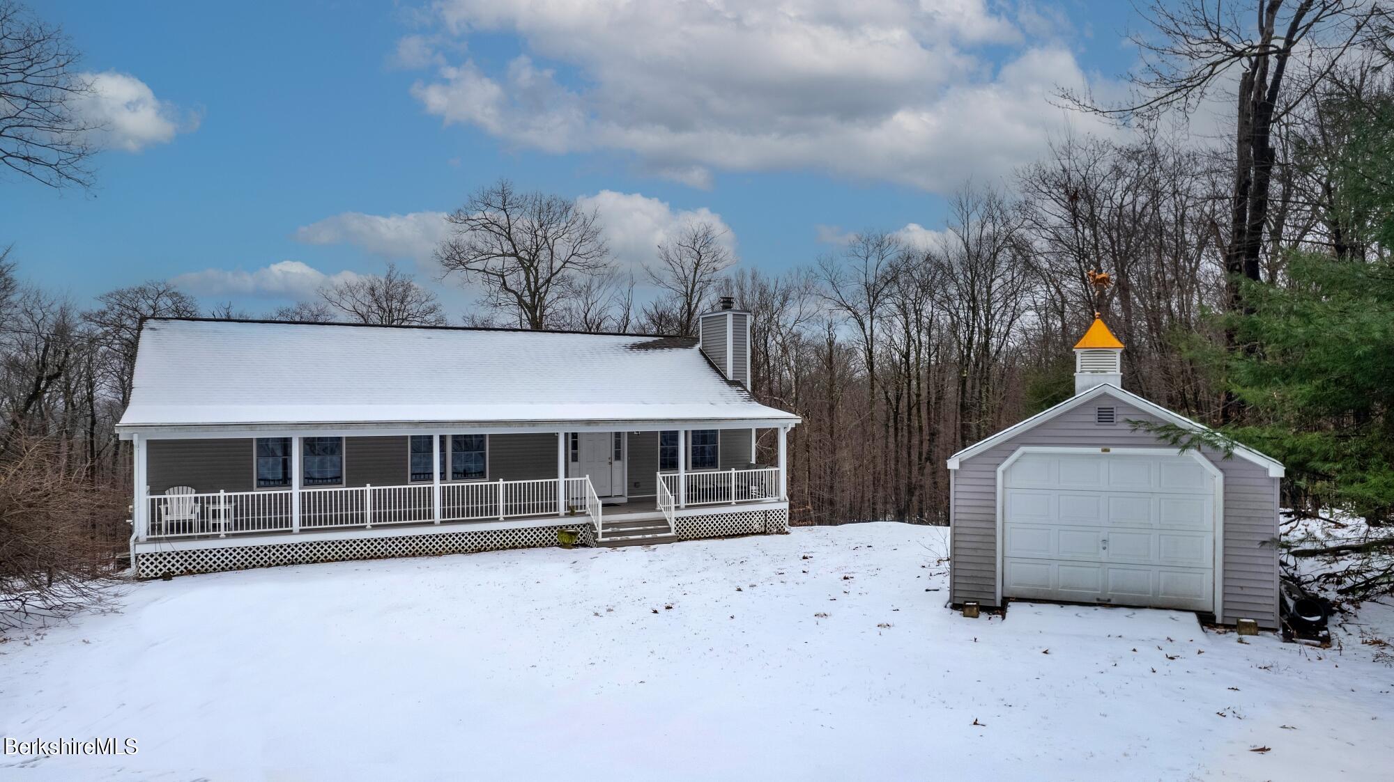30 Norwalk Acres Road Monterey, MA 01245 - Photo 3 of 30 a view of house with a yard and large tree
