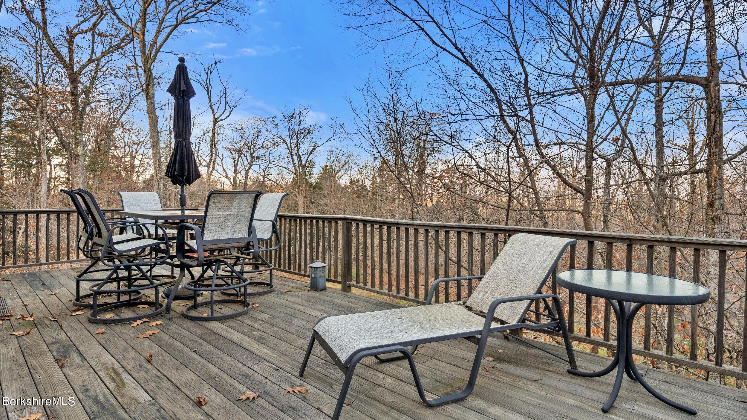 30 Norwalk Acres Road Monterey, MA 01245 - Photo 5 of 30 a view of a chairs and table on the wooden floor