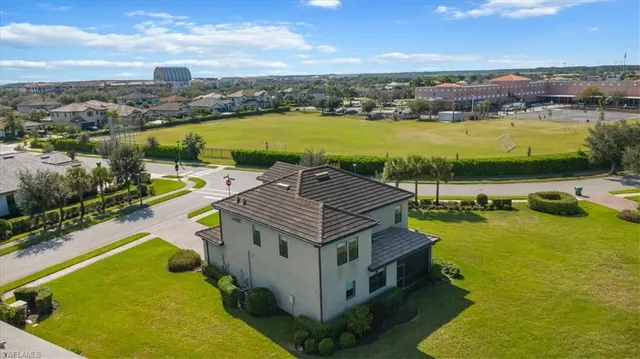 an aerial view of a house with a garden