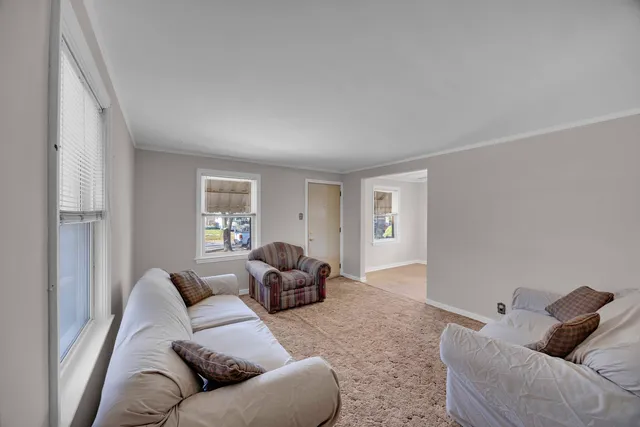 a living room with furniture and a couch