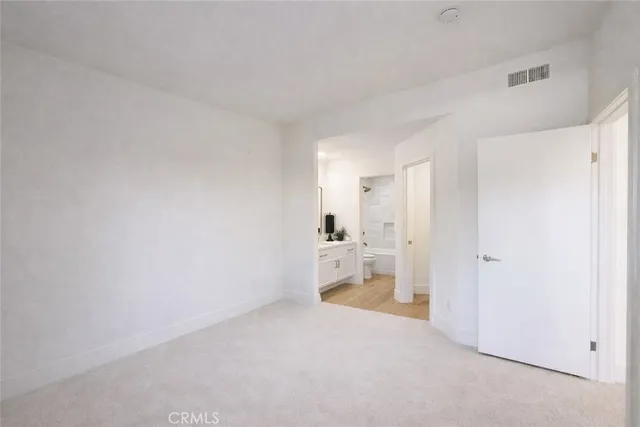 a big room with windows and closet