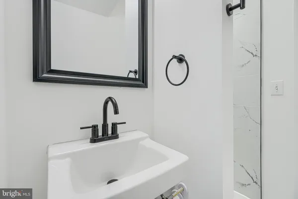 a picture of a room with a white wall and a white wall