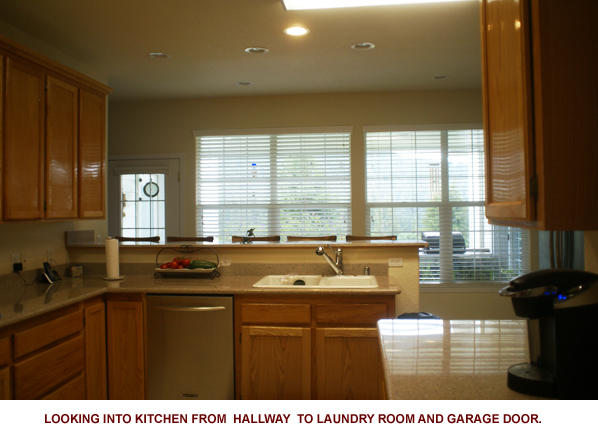 66 Madrone Road Weott, CA 95571 - Photo 11 of 40 NO. 24 KITCHEN FROM HALLWAY TO LAUNDRY