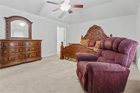 a bathroom with a sink vanity and a mirror
