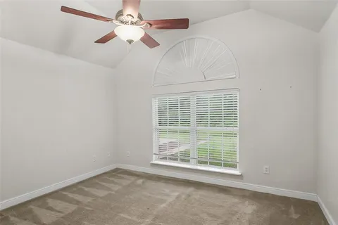 a view of cabinets and utility room with cabinets