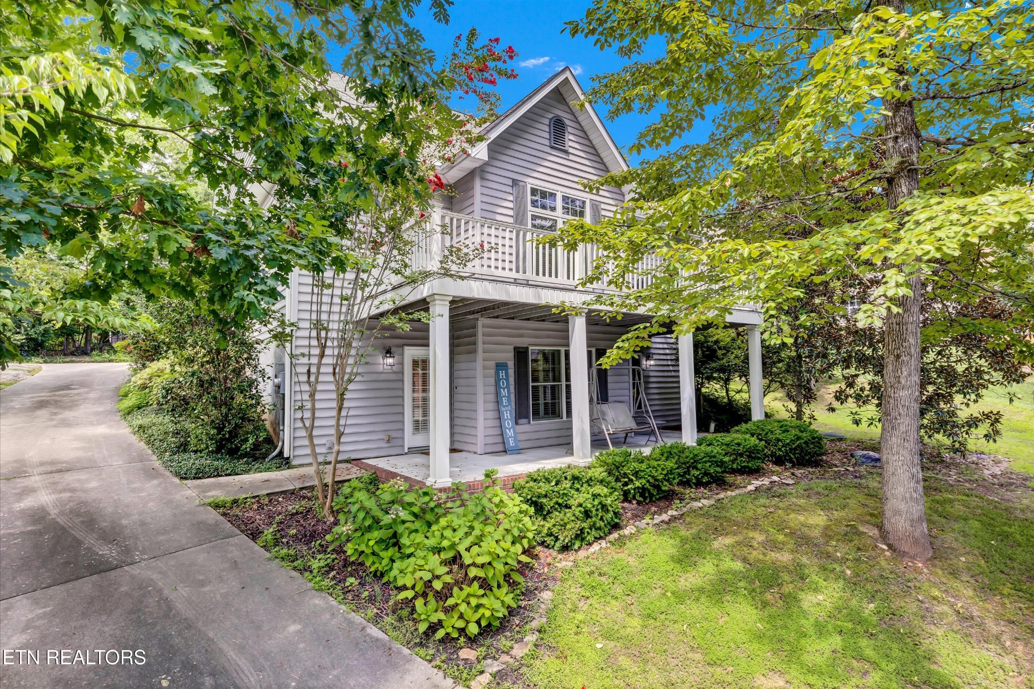 140 Ootsima Way Loudon, TN 37774 - Photo 1 of 31 front view of a house with a yard