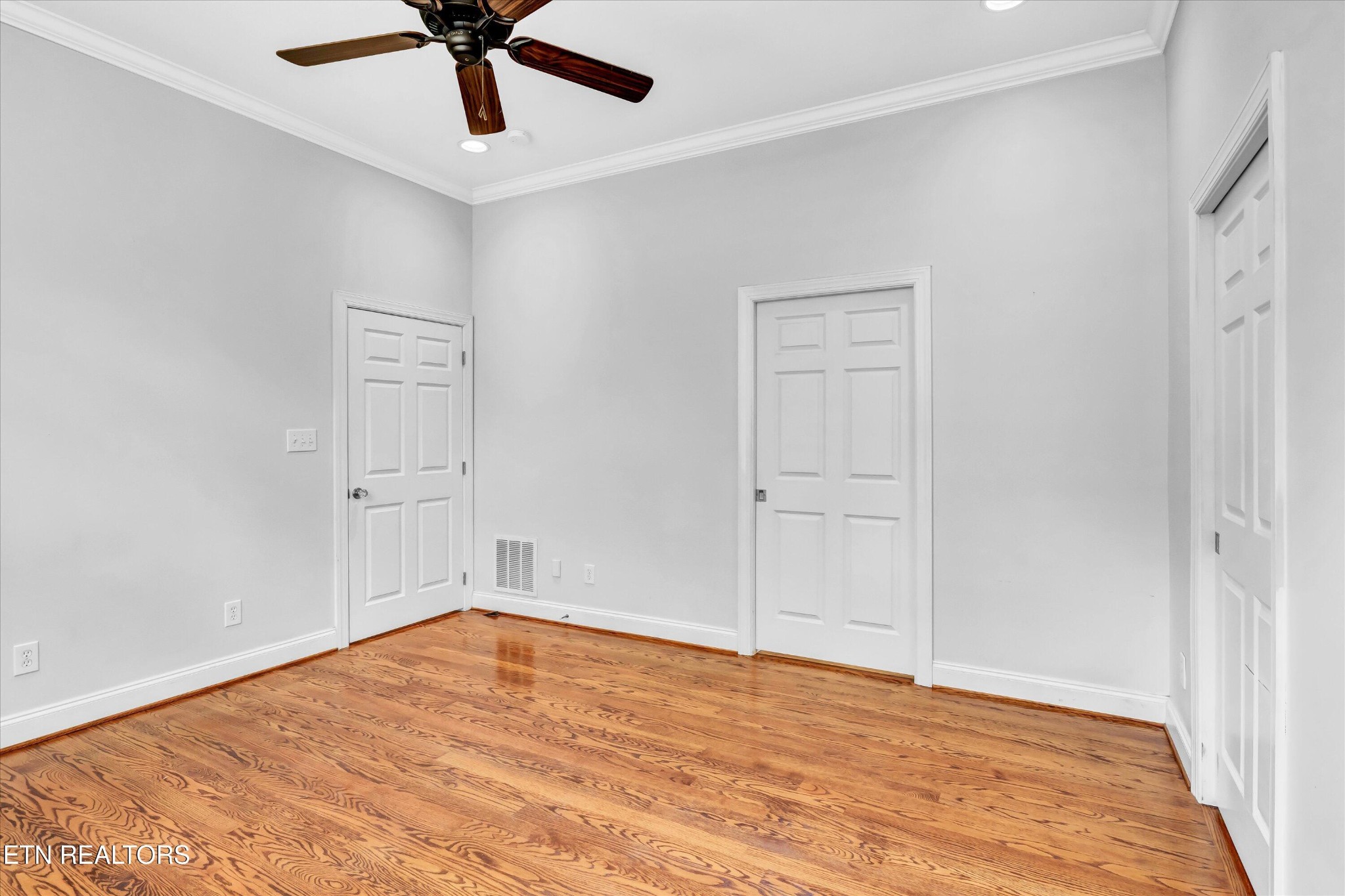140 Ootsima Way Loudon, TN 37774 - Photo 13 of 31 a view of empty room with wooden floor