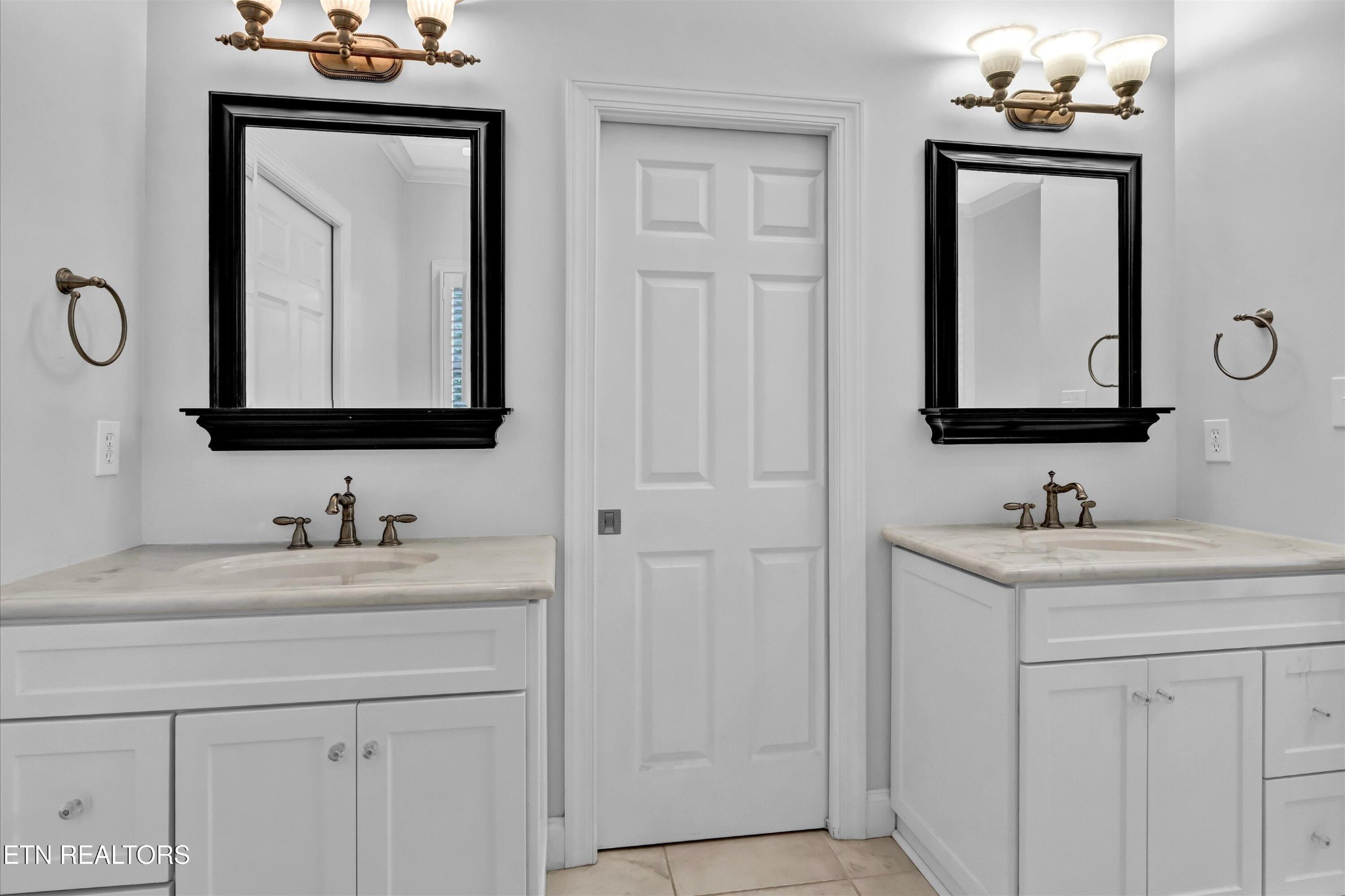 140 Ootsima Way Loudon, TN 37774 - Photo 17 of 31 a bathroom with a sink vanity and a mirror