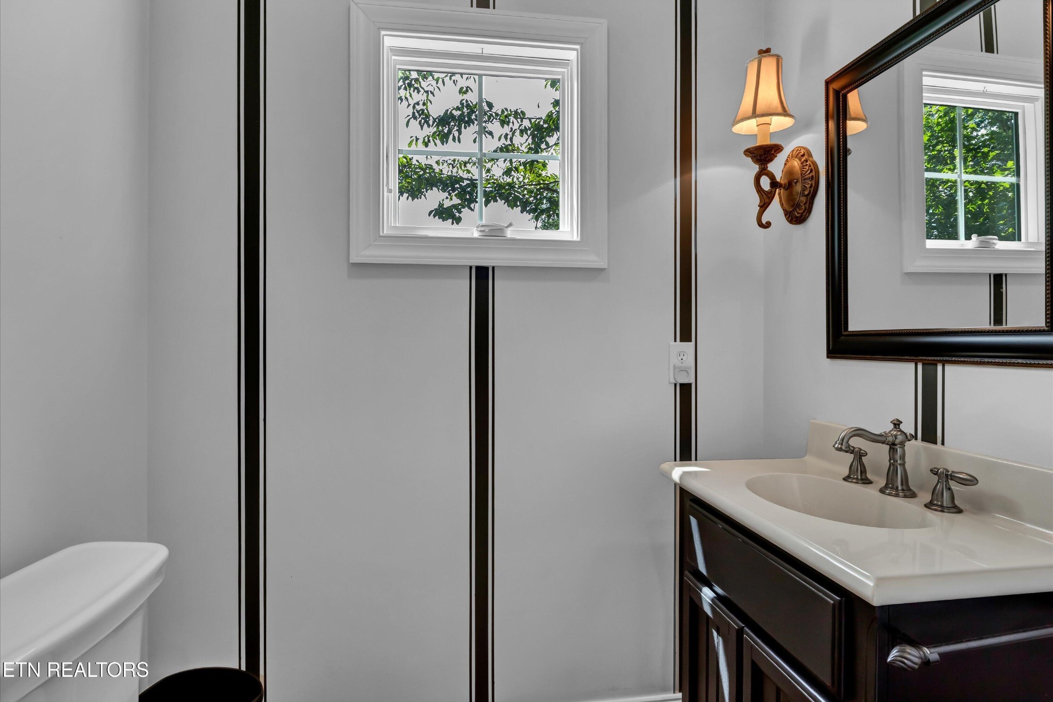 140 Ootsima Way Loudon, TN 37774 - Photo 18 of 31 a bathroom with a sink and a toilet