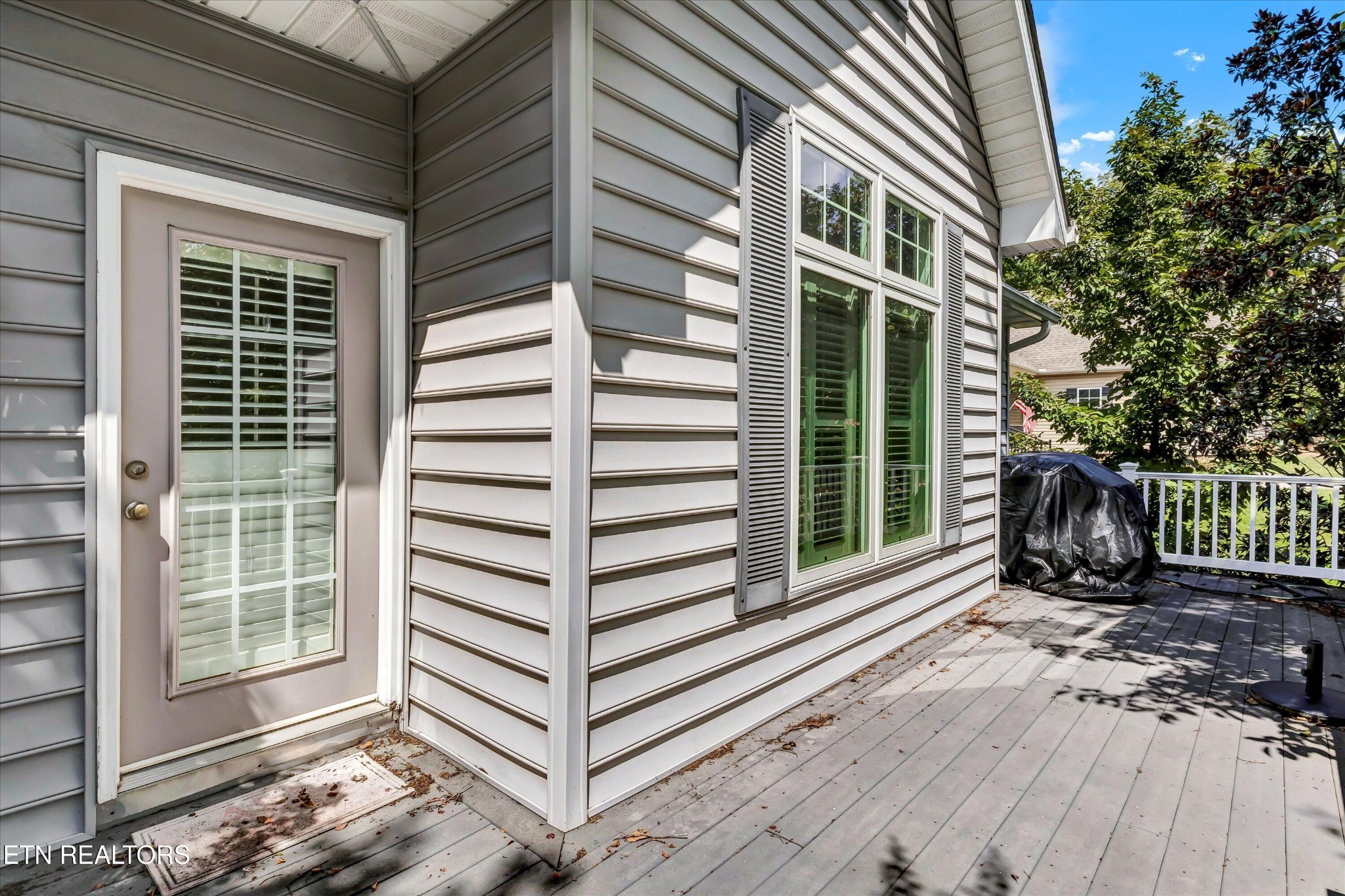 140 Ootsima Way Loudon, TN 37774 - Photo 27 of 31 a view of a house with a large window