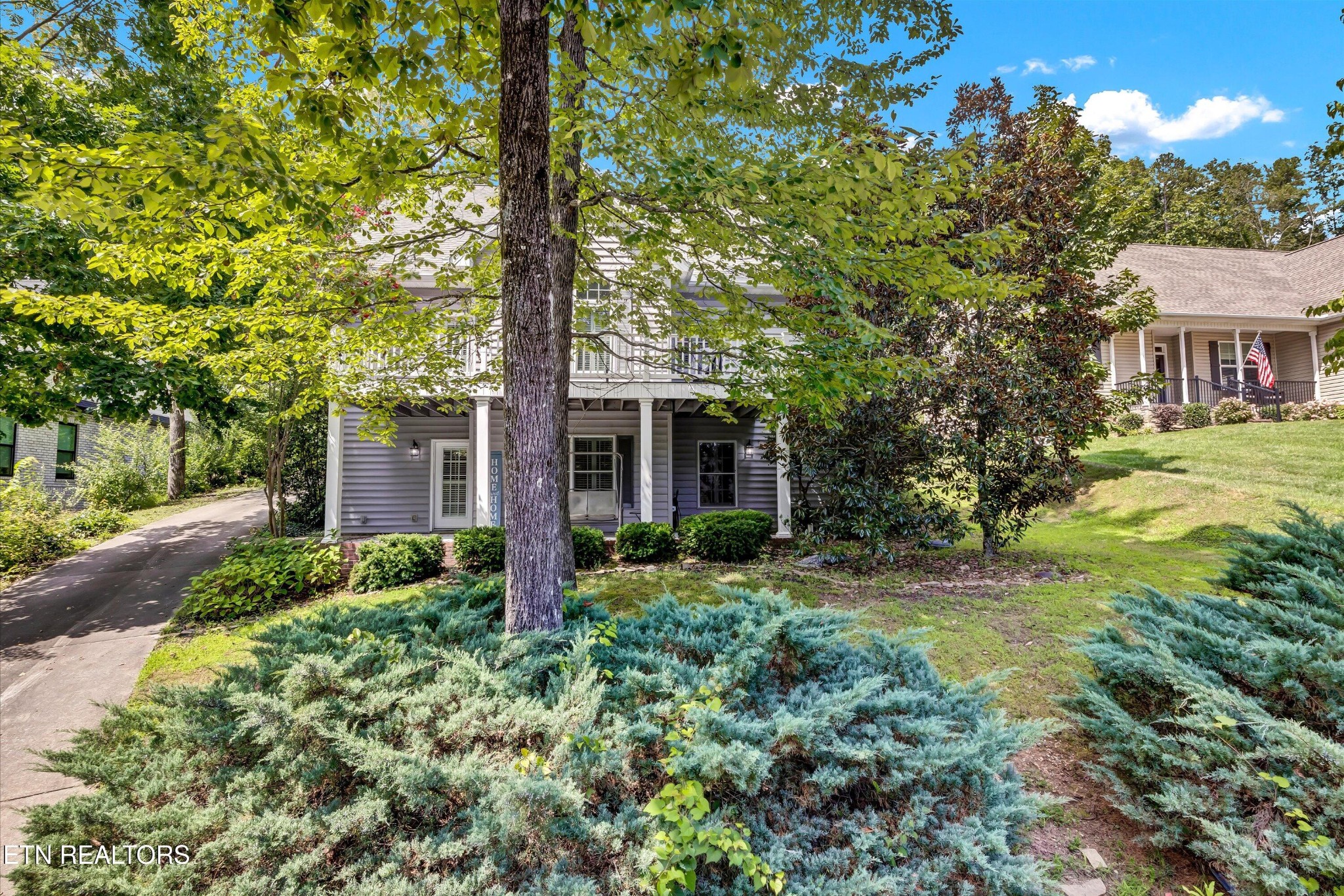 140 Ootsima Way Loudon, TN 37774 - Photo 29 of 31 a front view of a house with garden