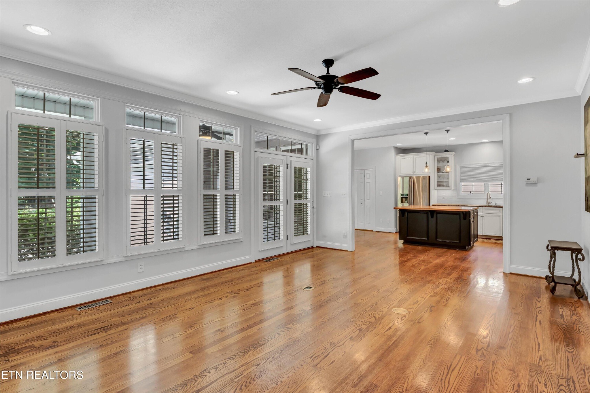 140 Ootsima Way Loudon, TN 37774 - Photo 5 of 31 a view of empty room with wooden floor and fan