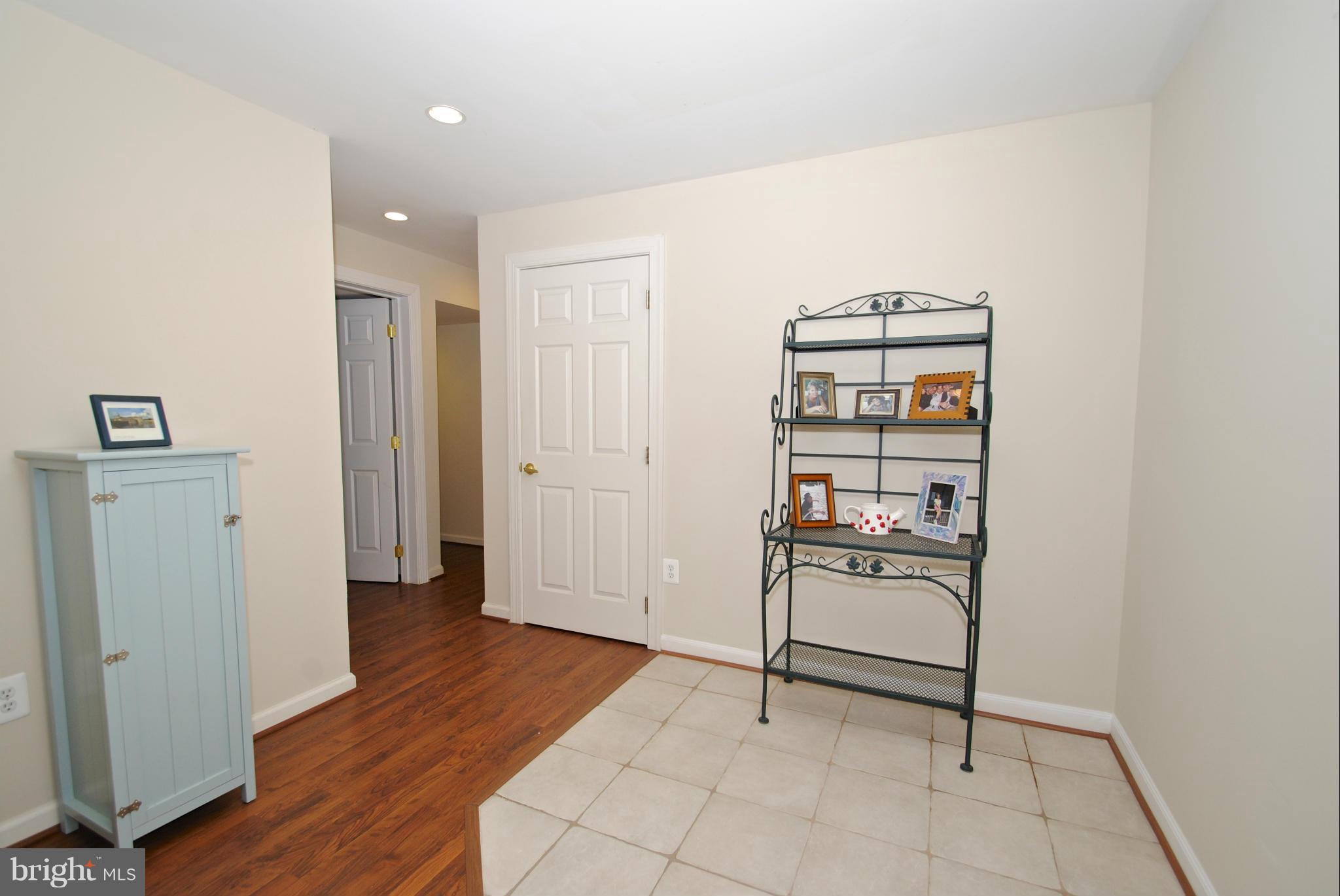 201 Ladybug Way Edgewater, MD 21037 - Photo 26 of 30 Basement tiled area can be kitchenette, if desired