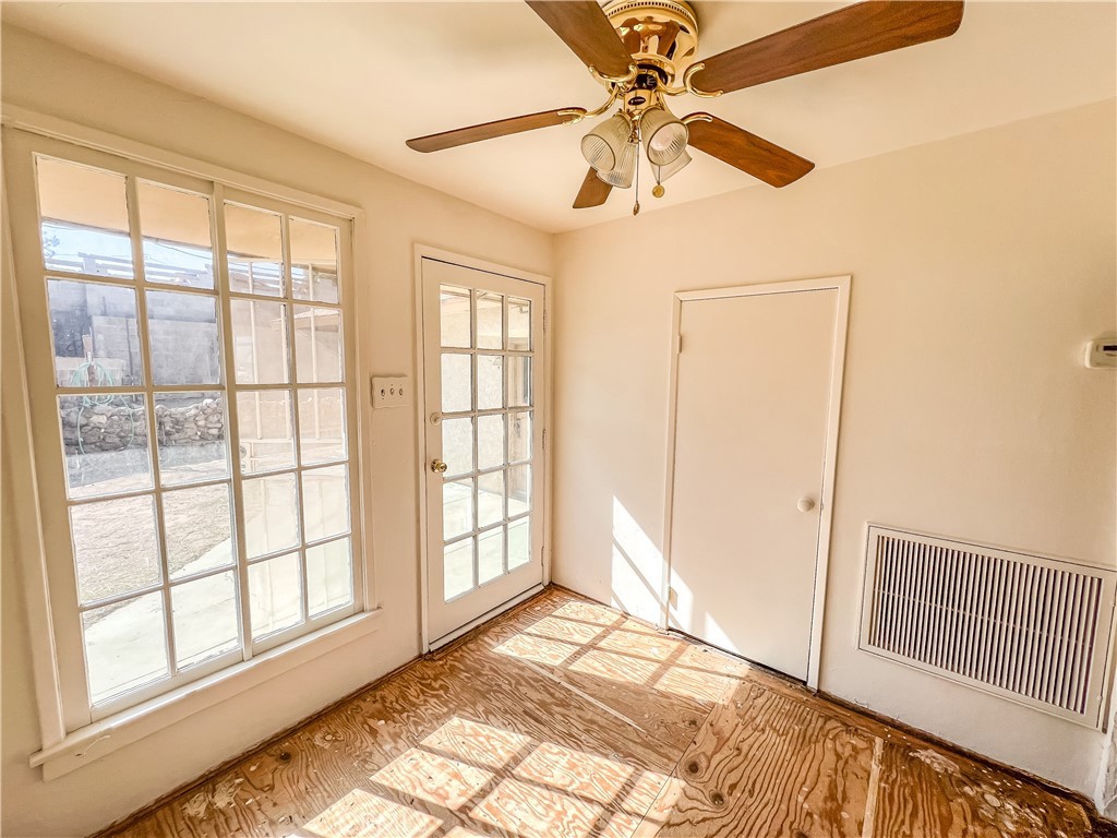 506 Desnok Street Needles, CA 92363 - Photo 27 of 70 a view of an empty room with a window