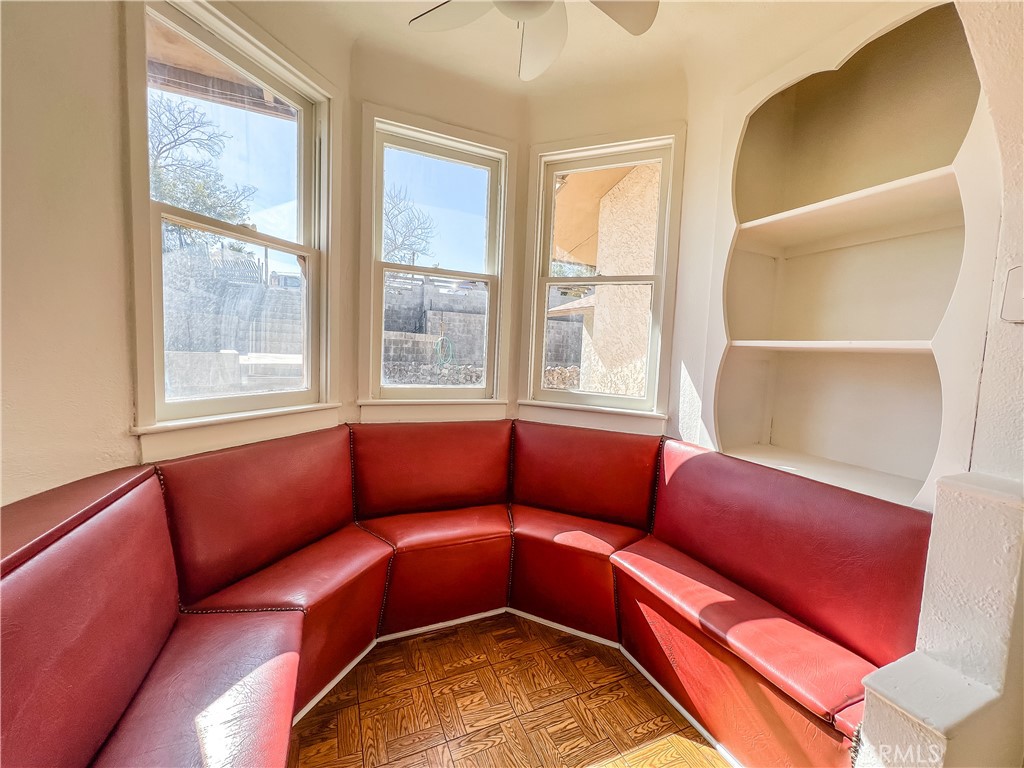 506 Desnok Street Needles, CA 92363 - Photo 39 of 70 a living room with furniture and a window