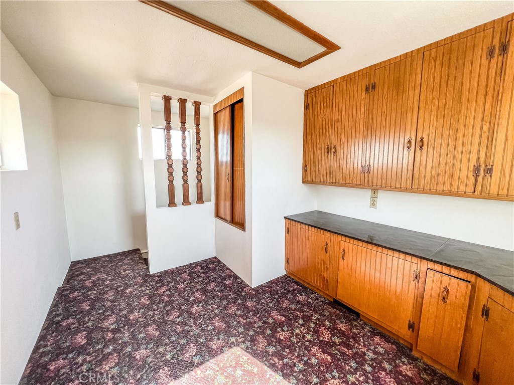 506 Desnok Street Needles, CA 92363 - Photo 49 of 70 a spacious bathroom with a granite countertop sink and a bathtub