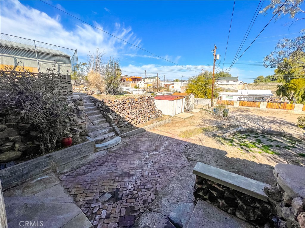 506 Desnok Street Needles, CA 92363 - Photo 5 of 70 a view of a backyard of the house