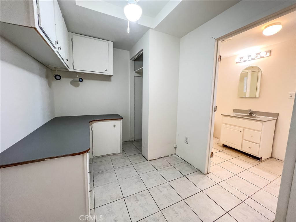 506 Desnok Street Needles, CA 92363 - Photo 54 of 70 a view of a storage & utility room with cabinets