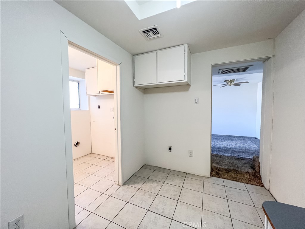 506 Desnok Street Needles, CA 92363 - Photo 60 of 70 a view of an empty room with closet and a window