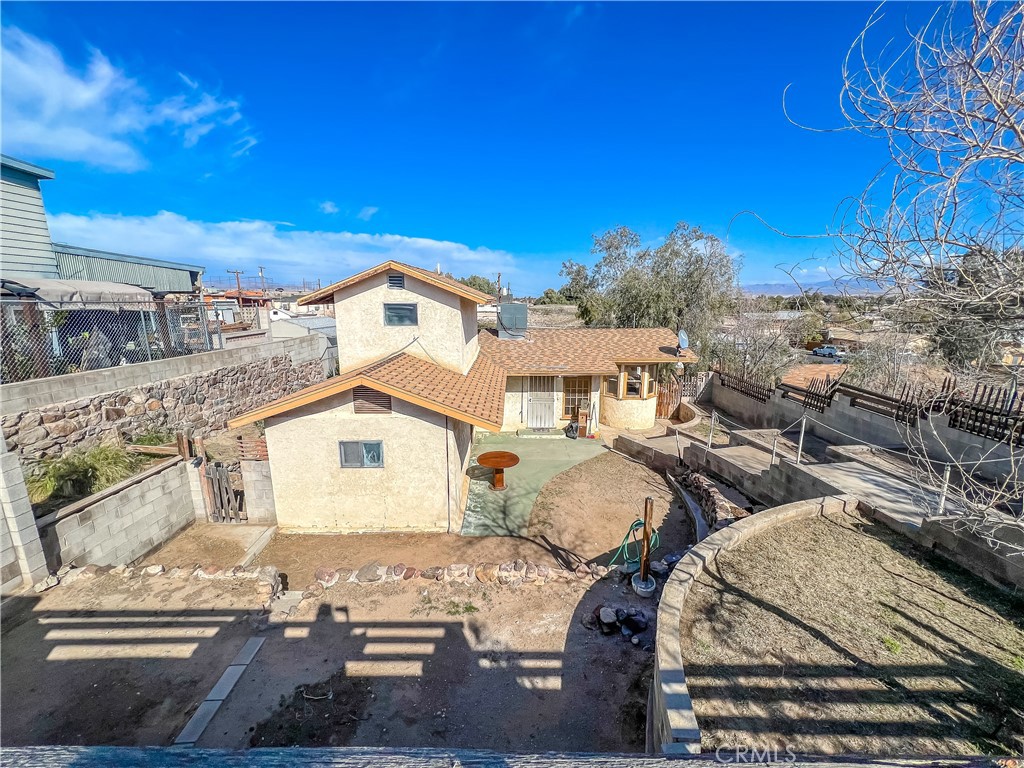 506 Desnok Street Needles, CA 92363 - Photo 68 of 70 a view of a house with a yard
