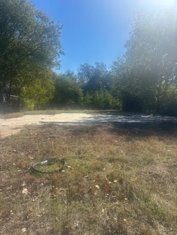 a view of lot of trees and lake