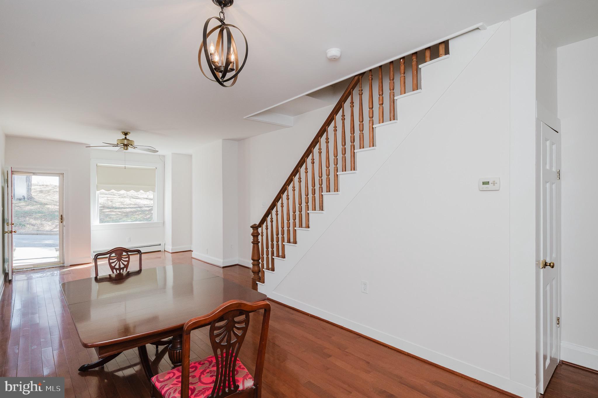 3518 Poole Street Baltimore, MD 21211 - Photo 11 of 59 a view of dining room and wooden floor