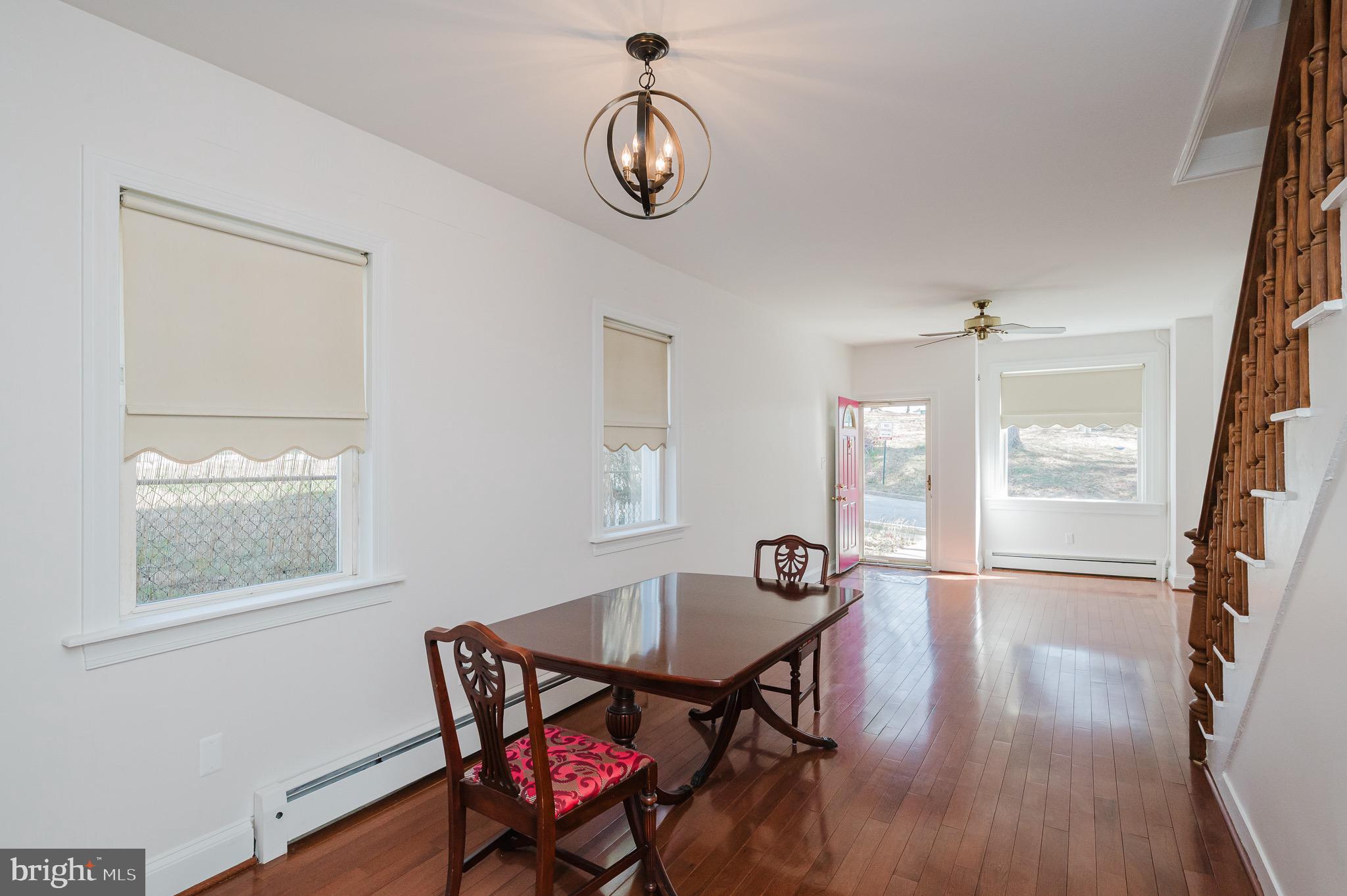 3518 Poole Street Baltimore, MD 21211 - Photo 12 of 59 a view of a room that has a table and chairs