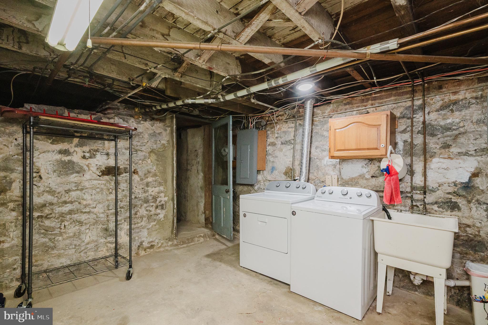 3518 Poole Street Baltimore, MD 21211 - Photo 41 of 59 a utility room with dryer and washer