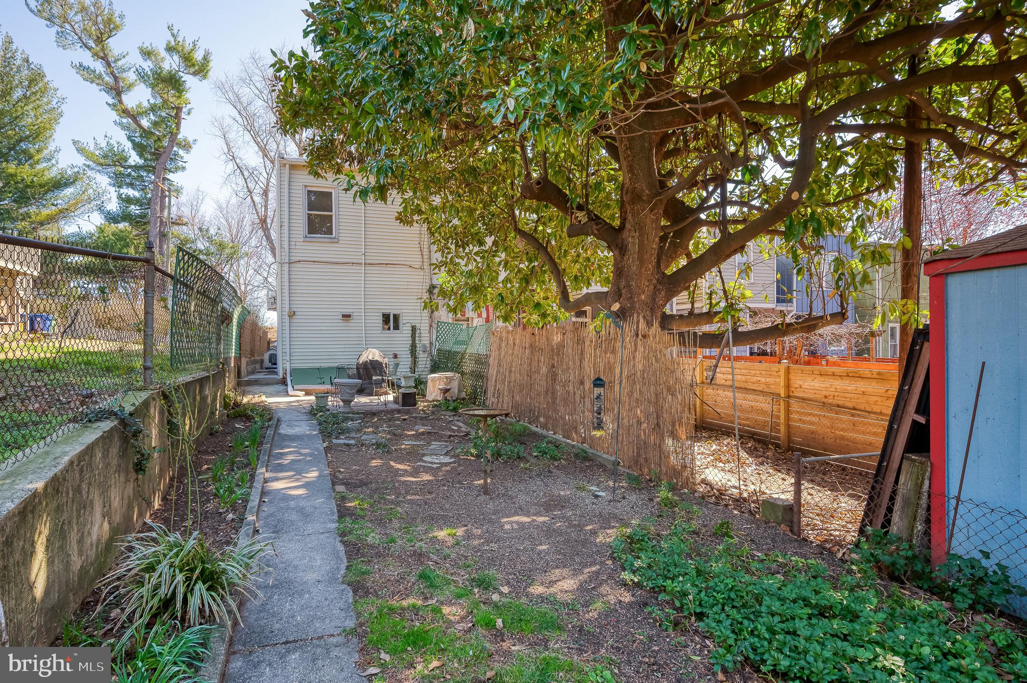3518 Poole Street Baltimore, MD 21211 - Photo 48 of 59 a view of a backyard with a barn