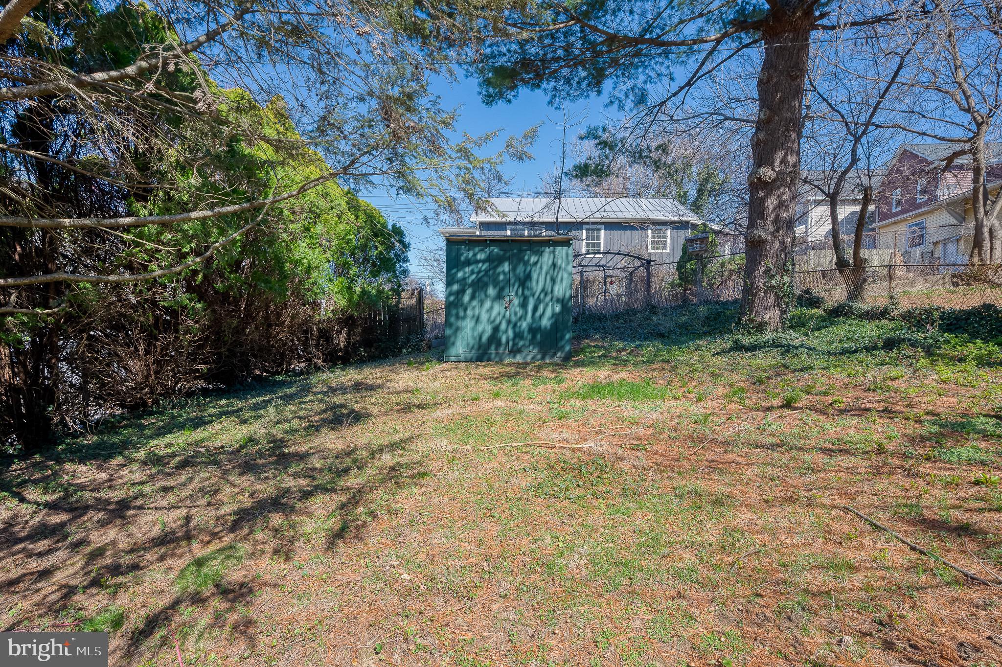 3518 Poole Street Baltimore, MD 21211 - Photo 52 of 59 a backyard of a house with lots of green space