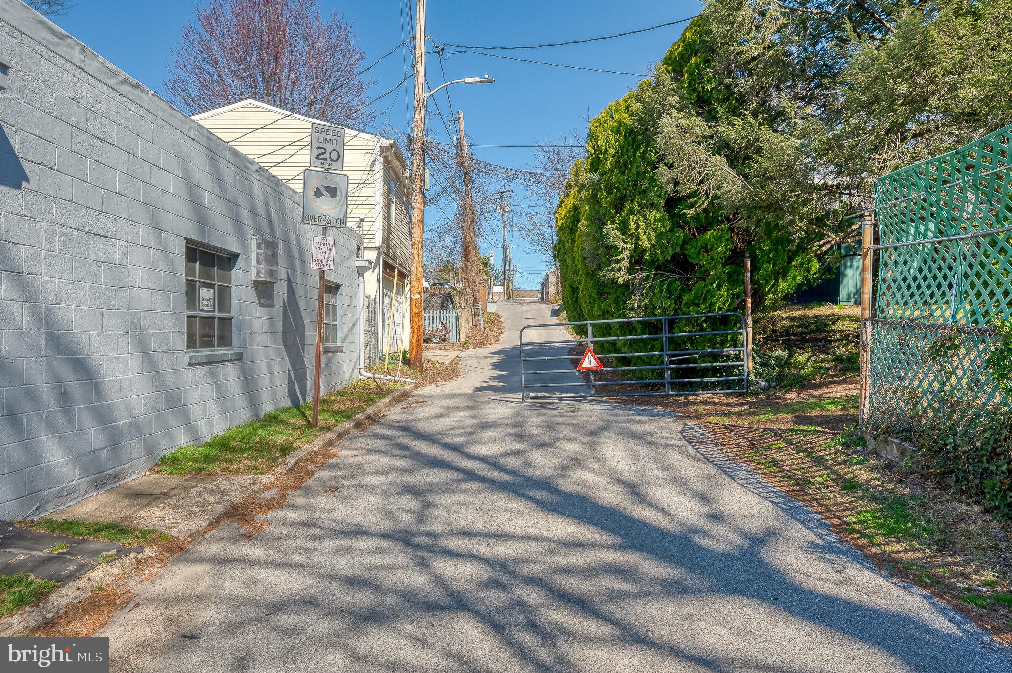3518 Poole Street Baltimore, MD 21211 - Photo 54 of 59 a backyard of a house with lots of green space