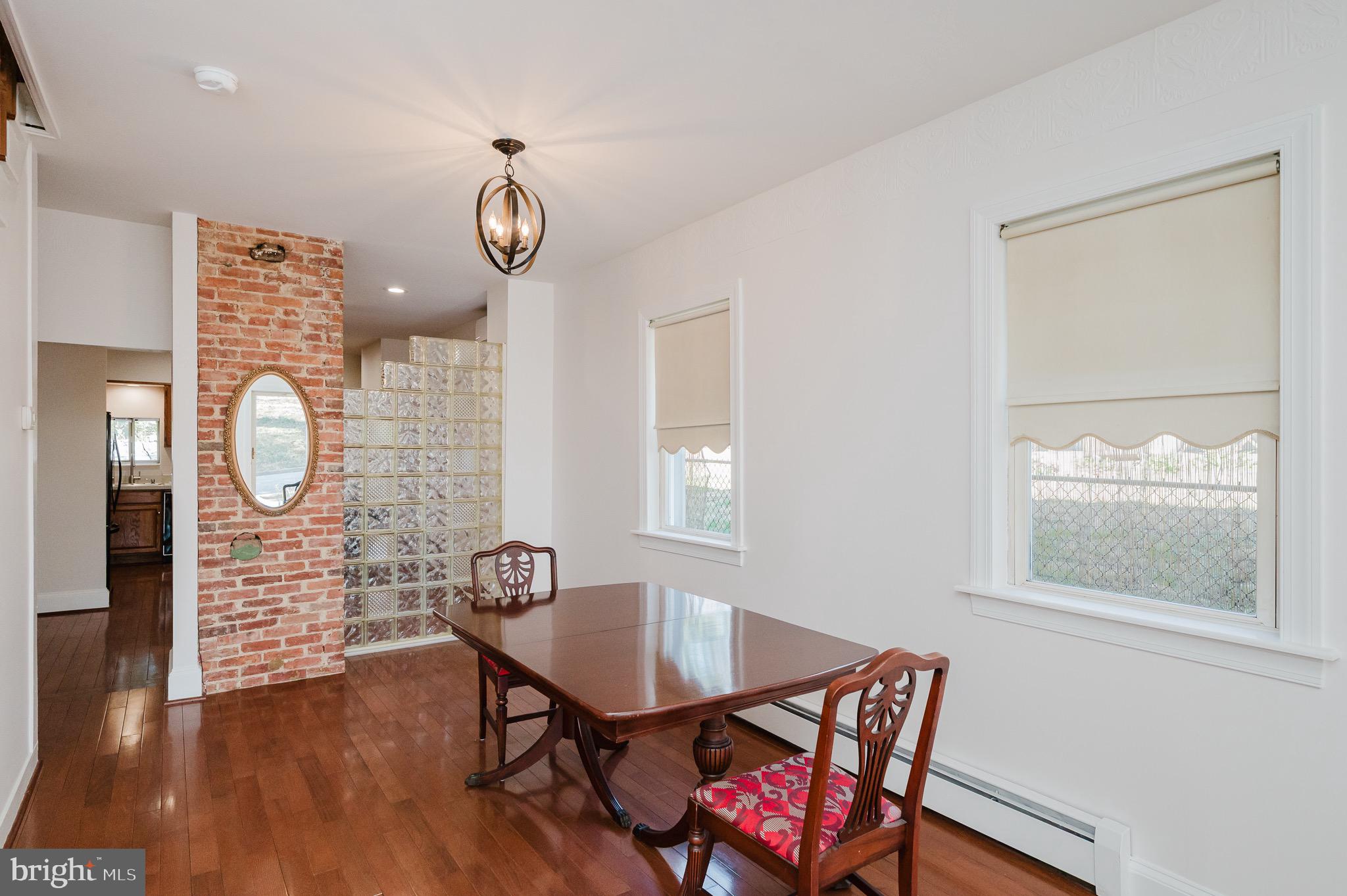 3518 Poole Street Baltimore, MD 21211 - Photo 9 of 59 a view of a livingroom with furniture and wooden floor
