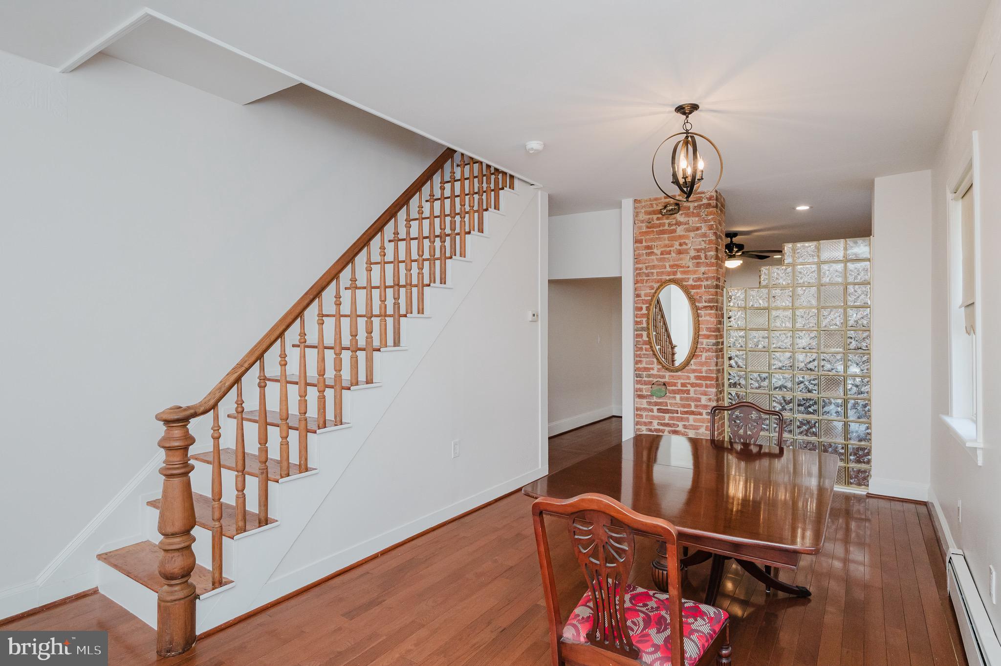 3518 Poole Street Baltimore, MD 21211 - Photo 10 of 59 a view of entryway with wooden floor