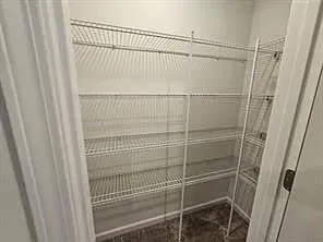 a bathroom with a glass door shower