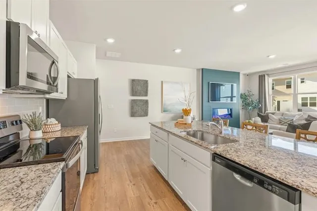 a kitchen with granite countertop lots of counter top space