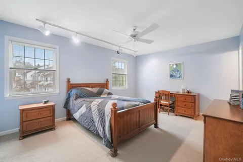 a bed room with a bed and furniture