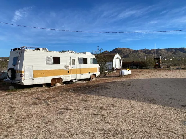 a view of a truck parked in front of a house