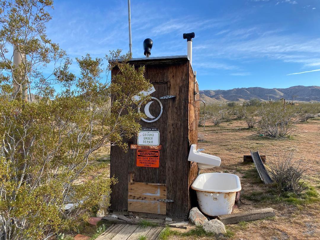5457 Larrea Road Johnson Valley, CA 92285 - Photo 6 of 22 a view of a outdoor space with a sink and fire pit