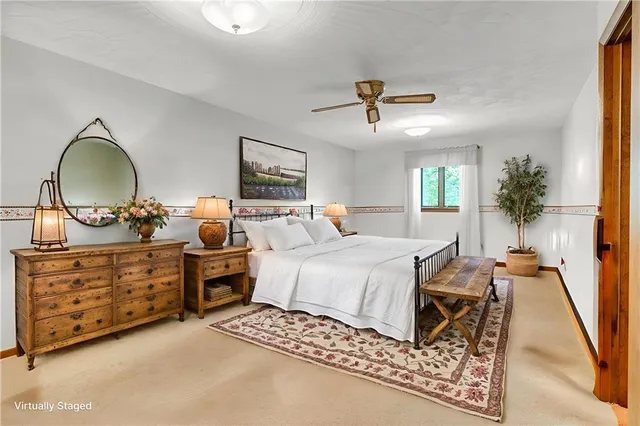 a bed room with a bed and a dresser