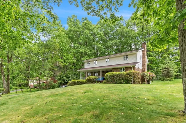 a house view with a garden space