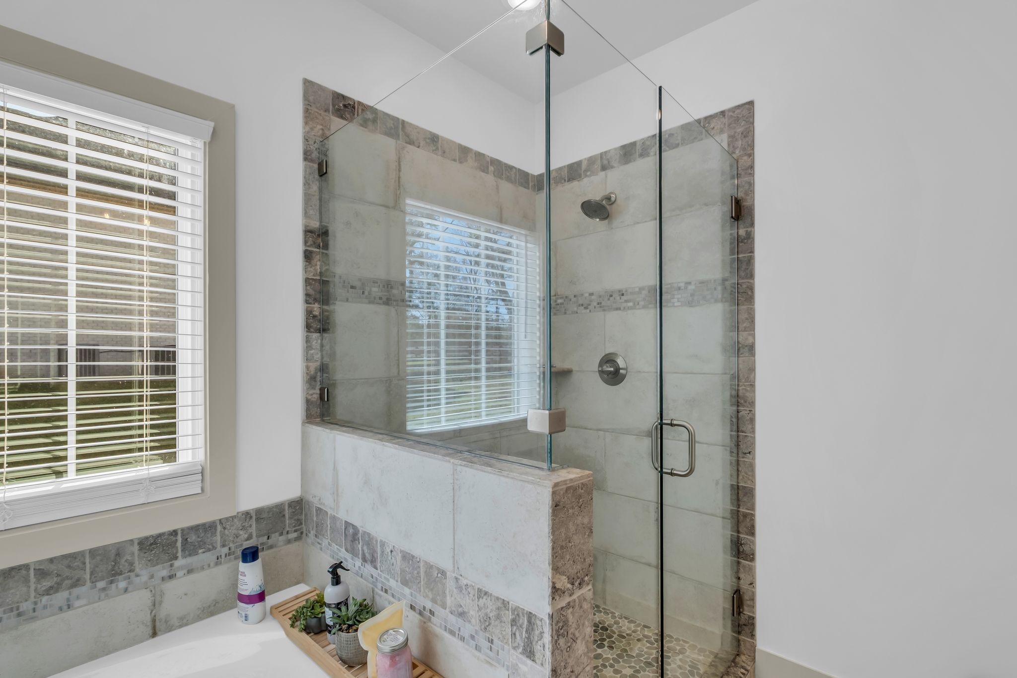 807 Ridgestone Place Lebanon, TN 37087 - Photo 18 of 34 a bathroom with a tub shower and sink